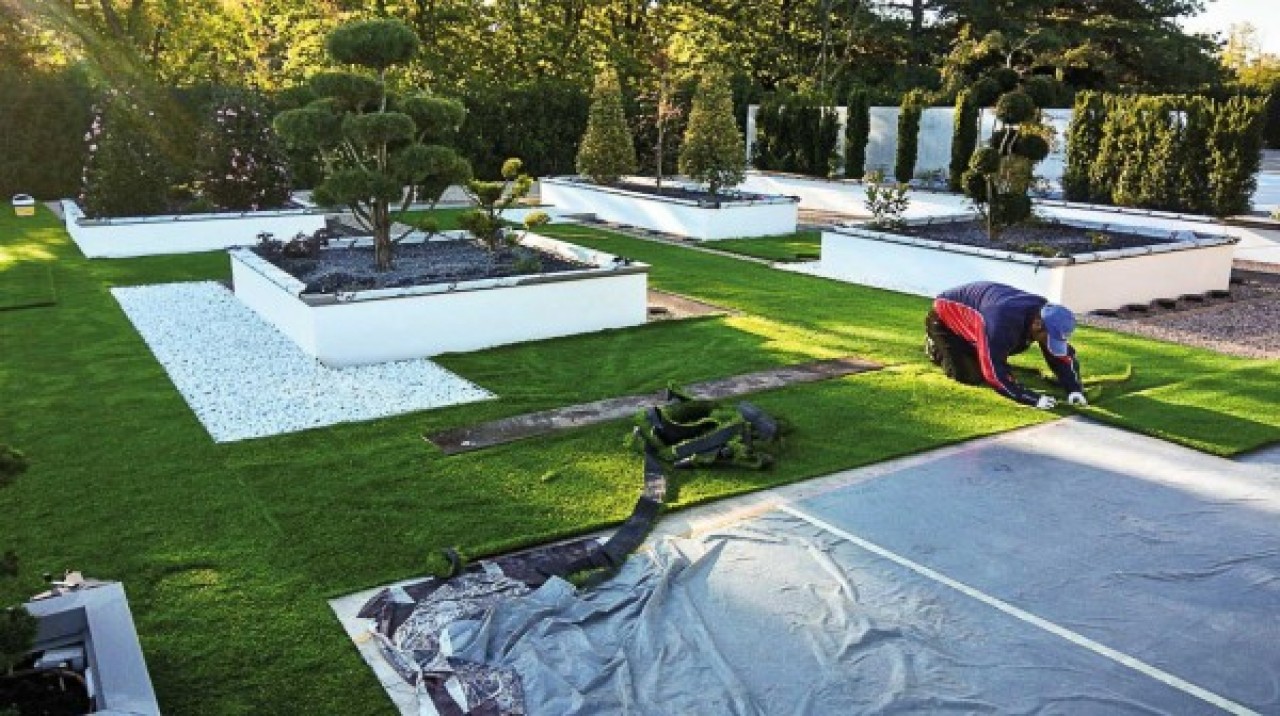 laying synthetic grass